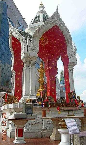 A spirit house in front of Central World Plaza, Bangkok.