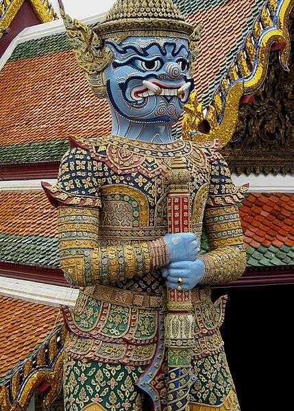 A Yaksha demon guards the Wat Phra Kaew (Temple of the Emerald Buddha) in the Grand Palace in Bangkok.
