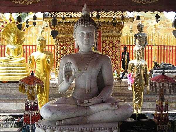 Buddahs saying &quot;sawatdee&quot; or hello in Chiang Mai, which has over 300 Buddhist temples.
