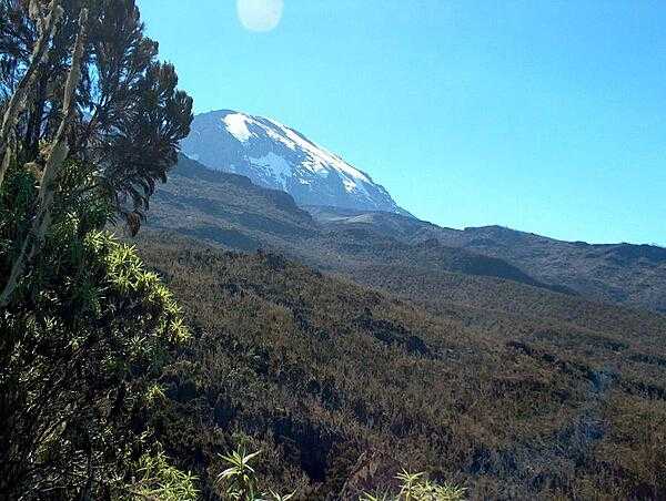 Mt. Kilimanjaro in Tanzania, Africa’s highest mountain and the world’s tallest freestanding volcano, is 5,895 m (19,341 ft) high. The origin of its name supposedly is a combination of the Swahili word kilima meaning “mountain” and the KiChagga word njaro, loosely translated as “whiteness” giving the name “White Mountain.” Mt. Kilimanjaro became a UNESCO World Heritage Site in 1987 and a Natural Wonder of Africa in 2013.