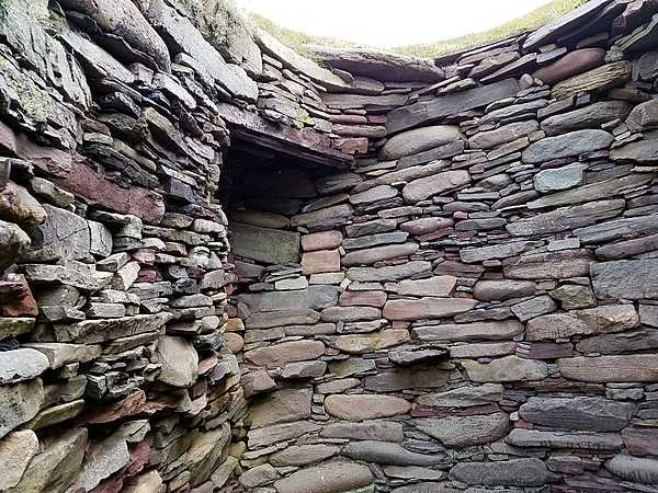 Walls of a Pict wheel house at Jarlshof in Shetland.