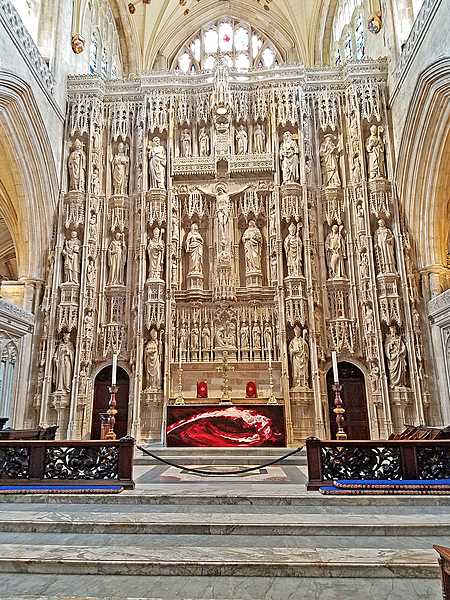 The High Altar of Winchester Cathedral features an ornate 15th-century stone screen.