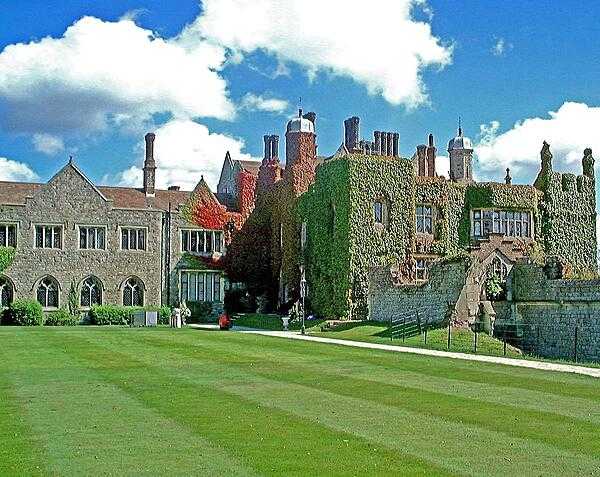 Much of the exterior of Eastwell Manor in Ashford, Kent, is draped with ivy.