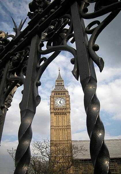 Big Ben as seen through the gates of the Palace of Westminster, London.