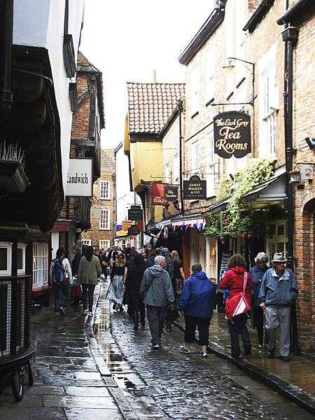 The Shambles, formerly an open-air meat market in York, is now a popular tourist destination lined with picturesque shops.