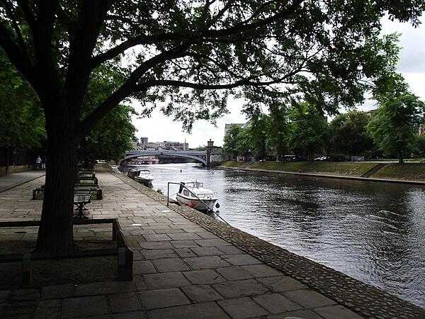 Promenade along the River Ouse in York. Lendal Bridge appears in the background.