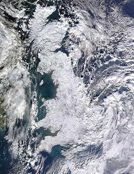 Dramatic satellite image of Britain taken 7 January 2010 shows the island completely snow covered during the record-breaking European winter of 2009-10. Image courtesy of NASA.