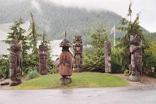 &quot;Clan Council&quot; totem pole arrangement atop Cape Fox Hill, Ketchikan, Alaska.
