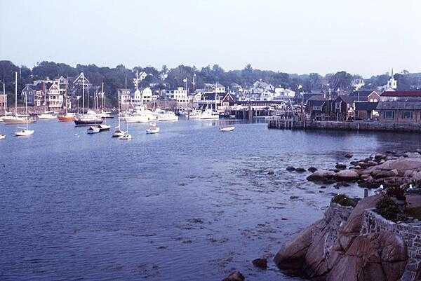 A view of Rockport, Massachusetts, some 40 km (25 mi) northeast of Boston, at the tip of the Cape Ann peninsula. First settled in the 17th century, the town&apos;s economy was long based on timber, fishing, and granite quarrying. Today it is a popular tourist site and artists colony.