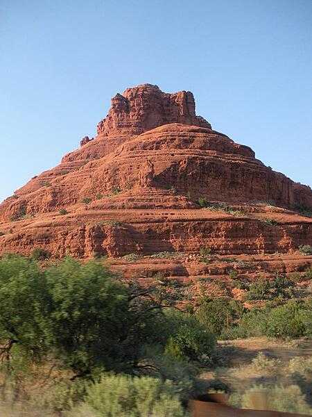 Bell Rock is a butte south of Sedona, Arizona composed of horizontal beds of late Permian (approx. 285 million year old) sedimentary rock.