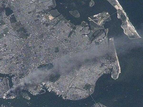 Another view of New York and environs taken from the International Space Station on 11  September 2001 following the attack on the World Trade Center. This image is one of a series taken that day of metropolitan New York City that shows the smoke plume rising from the Manhattan. Photo courtesy of NASA.