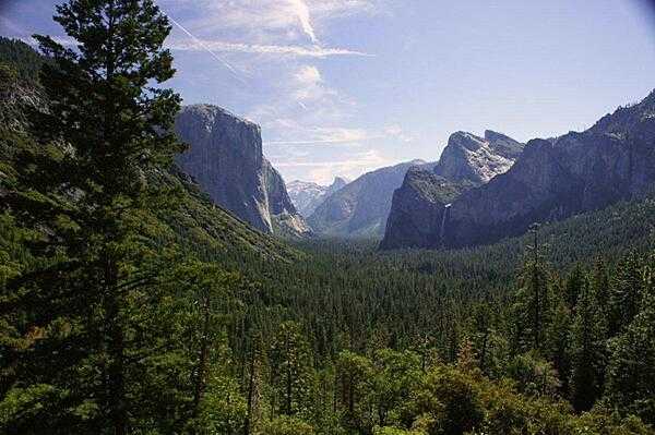 A view of Yosemite Valley as seen when exiting the tunnel on Wawona Road (Rt. 41) into the valley; it is probably one of the most photographed views of the valley. During the summer one may be hard pressed to find parking here.