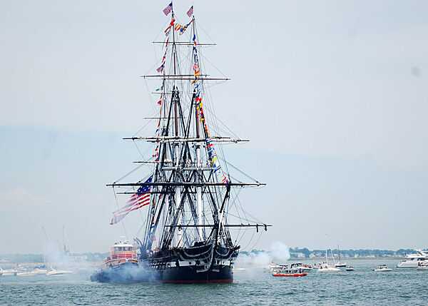 The USS Constitution fires a 21-gun salute during the ship's July 4th underway as part of Boston Harborfest. The six-day Fourth of July festival showcases Boston's Colonial and maritime heritage to honor and remember the past, celebrate the present, and educate the future with reenactments, concerts, and historical tours. Photo courtesy of the US Navy/ Mass Communication Specialist Seaman Shannon Heavin.