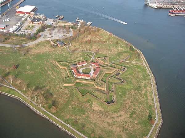 Aerial view of Fort McHenry National Monument and Historic Shrine in Baltimore, Maryland showing the entire tip of Locust Point. The fort is best known for its role in the War of 1812, when it successfully defended Baltimore Harbor from an attack by the British navy on 13-14 September 1814. The flying of the fort’s larger American garrison flag on the morning of the 14th following 25 hours of continuous bombardment signaled American victory and inspired Francis Scott Key to compose the poem “Defence of Fort M’Henry” that was later set to music and became known as “The Star Spangled Banner,” the national anthem of the United States. Photo courtesy of the National Park Service.