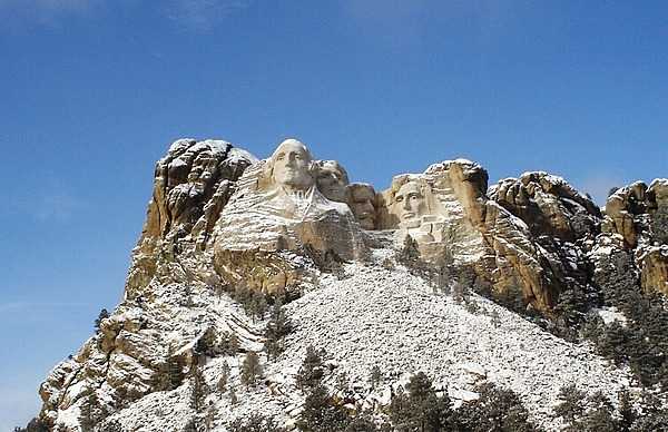 Mount Rushmore after a brief December snow storm. Image courtesy of the US National Park Service.