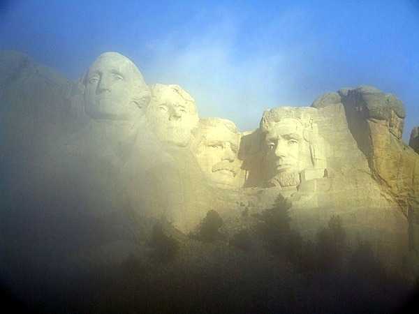 Mount Rushmore emerging from the fog. Image courtesy of the US National Park Service.