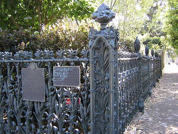 An unusual cornstalk and morning glory cast iron fence surrounds the Colonel Short Villa located on the corner of Fourth and Prytania Street in the Garden District of New Orleans.