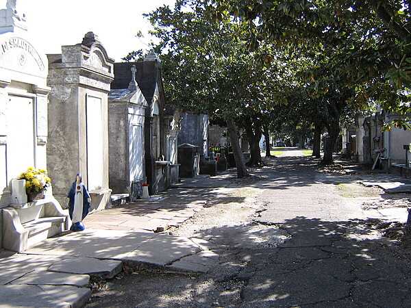 New Orleans is well known for the unique way in which its dead are buried - in above ground cemeteries and mausoleums. Because much of the city is at or below sea level, there is a high water table in the soil. If a body or coffin is placed in an in-ground tomb in New Orleans, there is risk of it being water-logged or even displaced from the ground. For this reason, the people of New Orleans have generally used above-ground tombs. Over the years as designs have evolved, these tombs have become architecturally, culturally, and historically distinct.