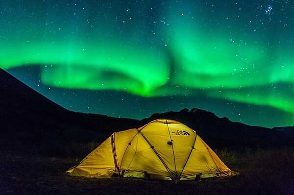 Northern lights are visible at night in Noatak National Preserve, Alaska from September through April. Photo courtesy of the US National Park Service/ Boris Koeten.