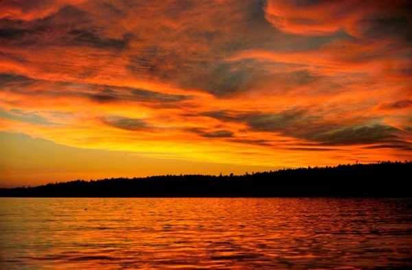 Fiery sunset over the San Juan Islands, Washington. Image courtesy of NOAA / George Leigh.