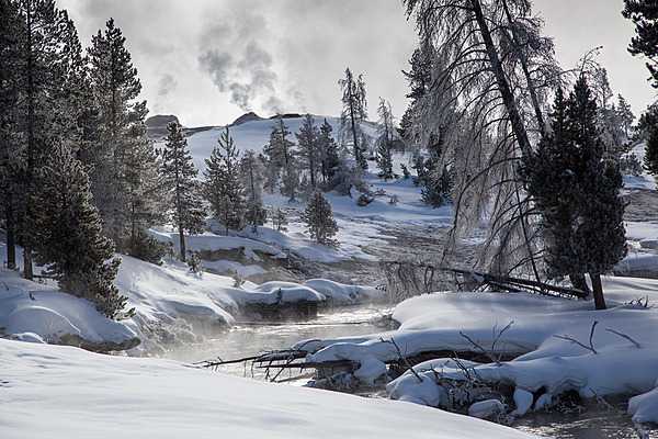 Firehole River in the Upper Geyser Basin in winter in Yellowstone National Park. Image courtesy of the US National Park Service/Neal Herbert.