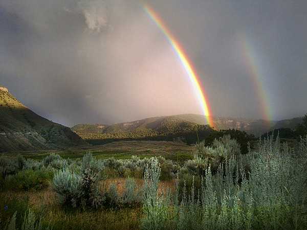 Double rainbow seen from Lower Mammoth in Yellowstone National Park. Image courtesy of the US National Park Service/Dan Hottle.