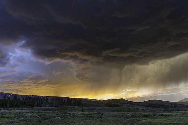 A thunderstorm at sunset at Swan Lake Flat in Yellowstone National Park. Image courtesy of the US National Park Service/Neal Herbert.