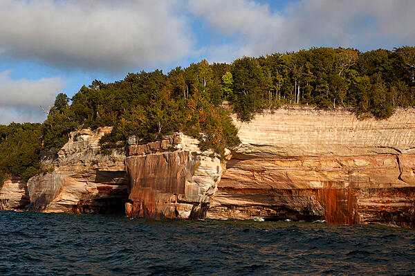 Orange-red sandstone cliffs at Pictured Rocks National Park, Michigan. Photo courtesy of the USGS.