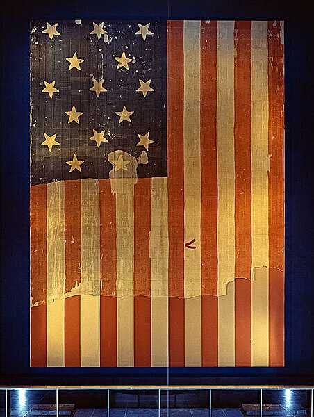 The original 15-star, 15-stripe Fort McHenry flag (The Star-Spangled Banner) that inspired the poem that became the lyrics to the US national anthem. The flag is on display at the Smithsonian's National Museum of History and Technology in Washington, D.C. Photo courtesy Smithsonian Institution Archives.