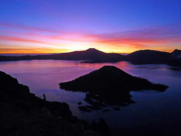 Sunrise Over Crater Lake, Oregon. A view from the top of Watchman Peak, just before sunrise. Photo courtesy of the US National Park Service.