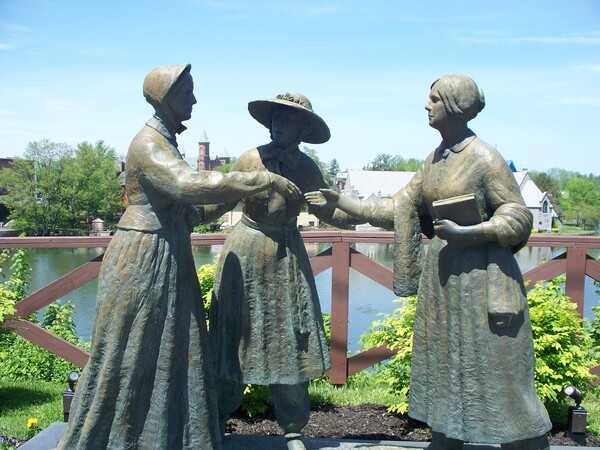 This statue in Seneca Falls, NY depicts the first meeting of the two iconic leaders of the American women's suffrage movement, Susan B. Anthony and Elizabeth Cady Stanton. The artwork, by sculptor Ted Aub, depicts a moment on 12 May 1851 when Amelia Jenks Bloomer, a dress reform advocate, introduced the two after an anti-slavery lecture. Seneca Falls is noted as the town where the American women's rights movement originated and Stanton and Anthony built the foundation for this movement. Photo courtesy of the US National Park Service.