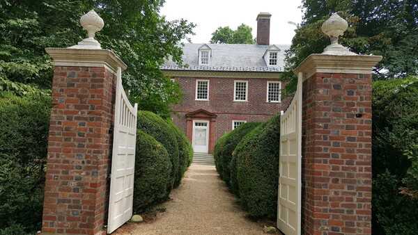 The entrance to Berkeley Plantation in Virginia, the birthplace of Benjamin Harrison V, a signer of the Declaration of Independence and governor of Virginia;  the birthplace of William Henry Harrison, the ninth US president; and the ancestral home of Benjamin Harrison, the 23rd president. Established in 1619, the plantation was the site of the first annual, English-speaking Thanksgiving in America, where the military tune "Taps" was composed and first played, and where the first bourbon whiskey in America was brewed.