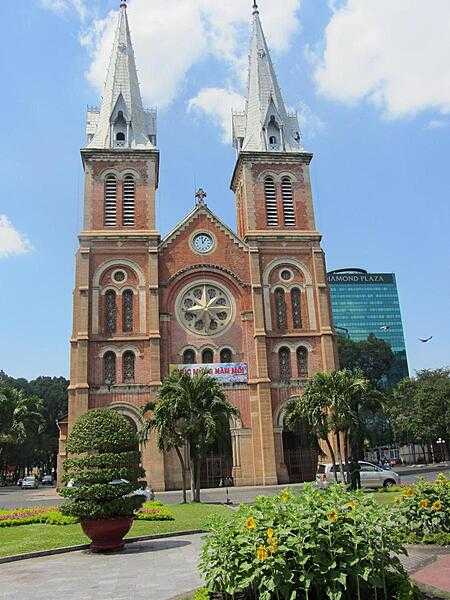 Notre Dame Cathedral in Saigon (Ho Chi Minh City) was built by French colonists from 1877 to 1880. The neo-Romanesque structure was constructed using stained-glass windows imported from Chartres and bricks from Marseilles. Masses are conducted in Vietnamese and English.