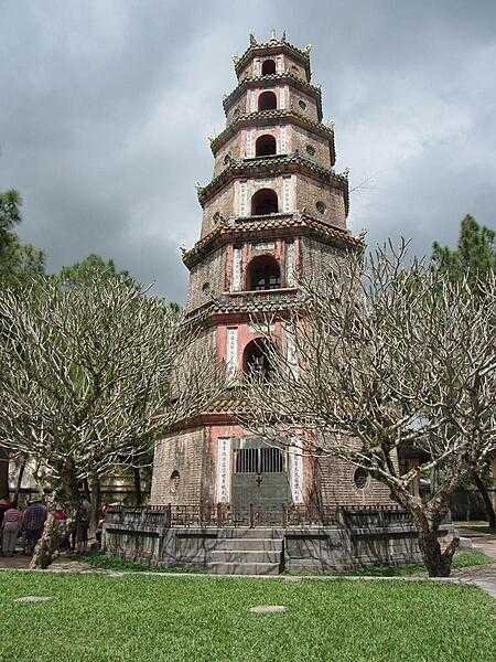 Phuoc Duyen Tower, an octagonal seven-level pagoda situated in the Thien Mu Pagoda temple complex located in the city of Hue, Vietnam, is regarded as the country’s unofficial symbol. Located on the northern bank of the Perfume River, the seven-story brick pagoda, built in 1844, is 21 m (68 ft) high and is the tallest pagoda in Vietnam.  Each level of the tower has a different Buddha statue.