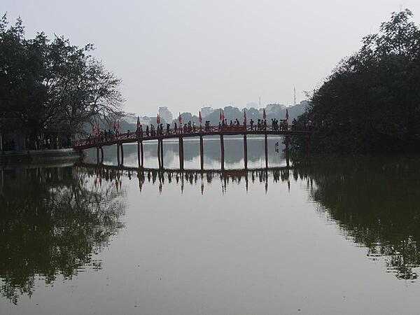 Footbridge over Hoan Kiem Lake in the center of Hanoi.