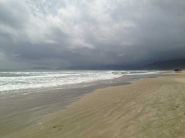 Low-hanging clouds threaten a deserted My Khe Beach (China Beach) near Da Nang.