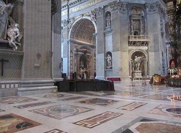 View to the right of the main altar in Saint Peter&apos;s Basilica in Rome.